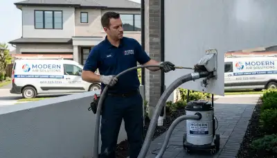 Technician performing professional dryer vent cleaning at Tucson, AZ home for Five Star Cooling